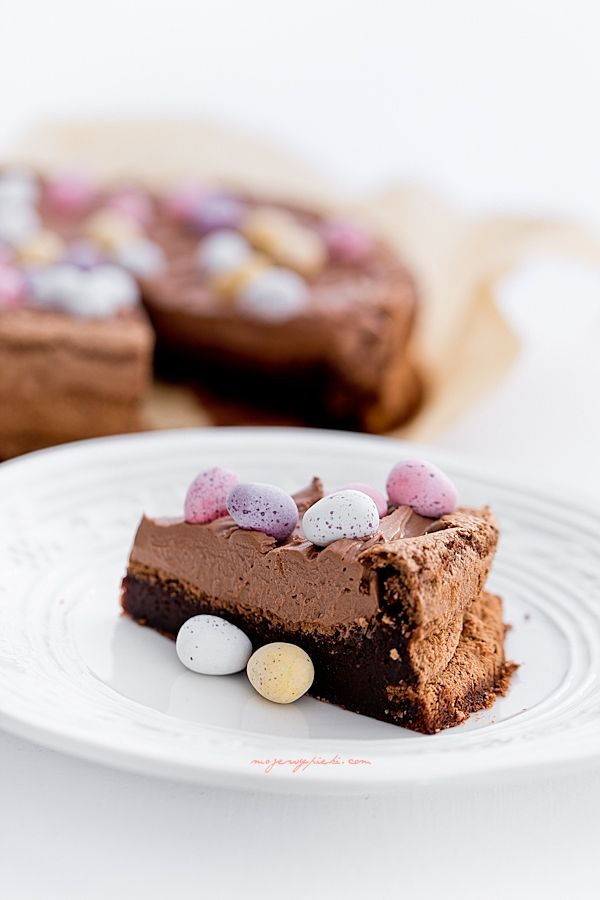Chocolate cake with cream and easter eggs