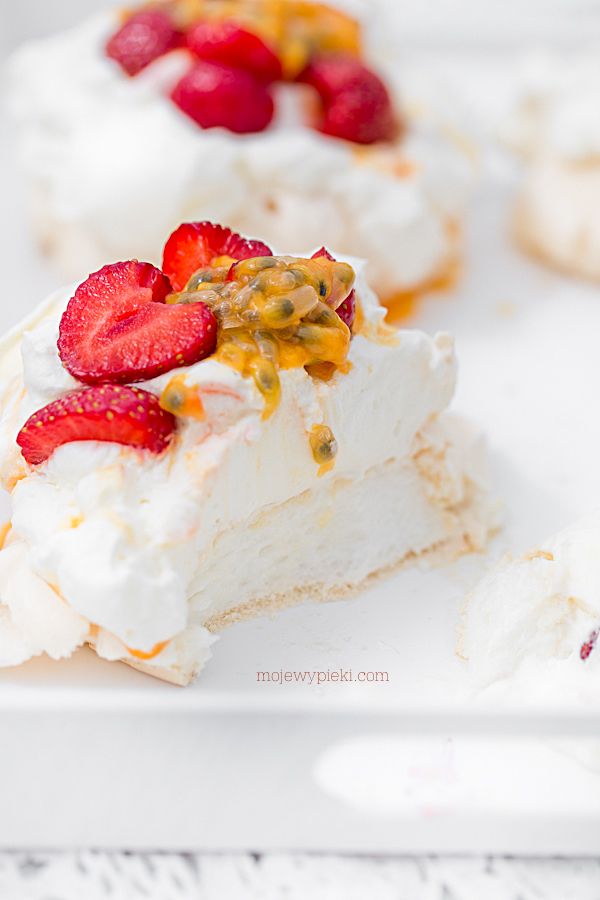 Mini Pavlovas with strawberries and passion fruit