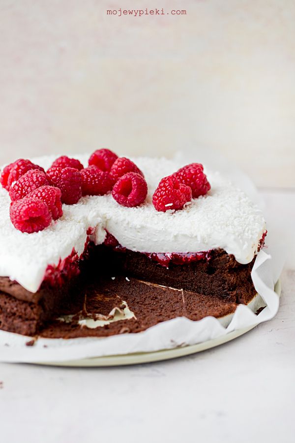 Sunken Chocolate Cake with Coconut Cream and Raspberries