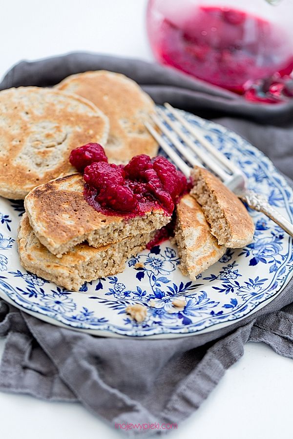Oat pancakes with raspberries in honey syrup