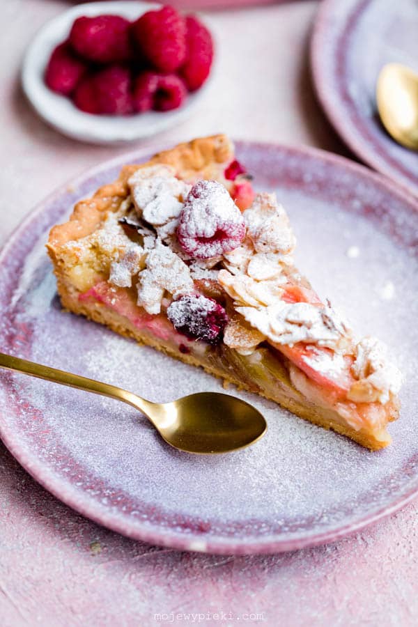 Rhubarb, raspberry and almond praline tart