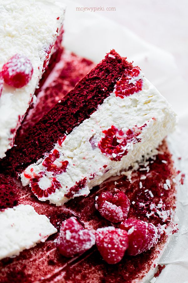 Raspberry and coconut dessert on red velvet cake